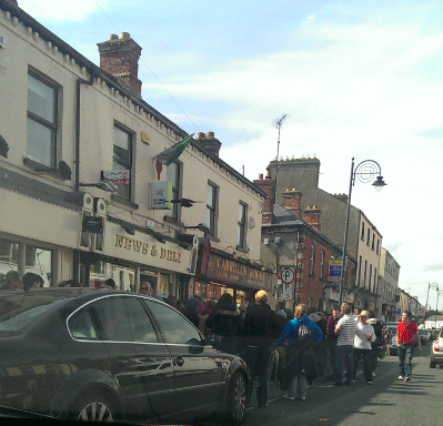 Crowds outside News &Deli in Park Street last May when the initial tickets went on sale