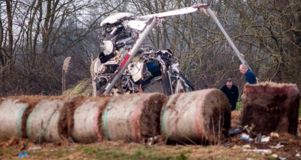 The wreckage of the helicopter in Gillingham, Norfolk, England, which crashed yesterday, killing all four occupants, including locally born businessman Edward Haughey.